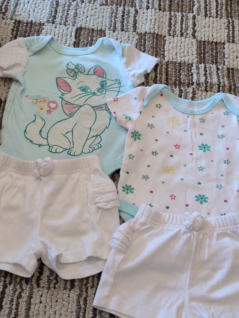 Disney White/Pastel Green Onsies & Old Navy Ruffle White Shorts.